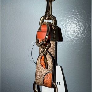 COACH TRIGGER SNAP BAG. SNAP BAG CHARM